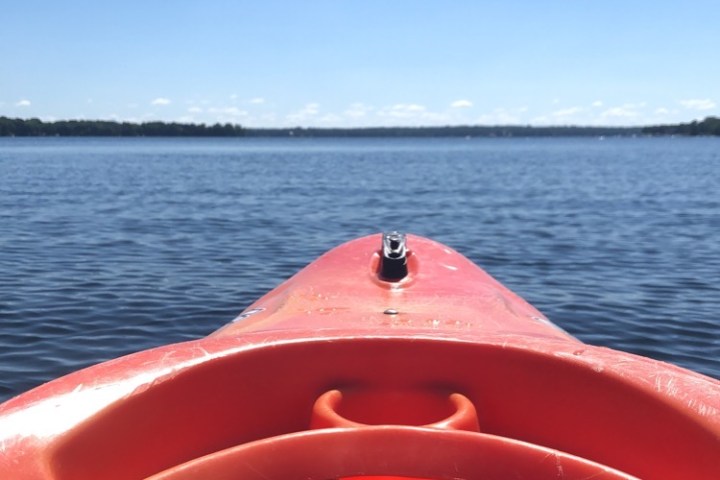 a boat sitting on top of a body of water